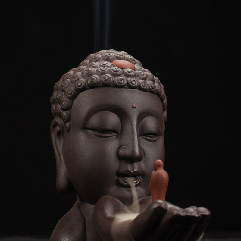 Little monk Buddha statue