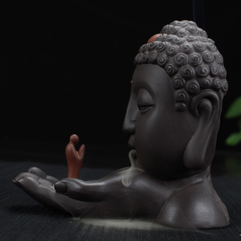 Little monk Buddha statue